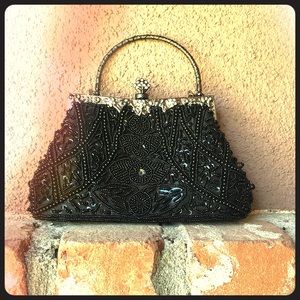 1920’s clutch. As new. Used once.